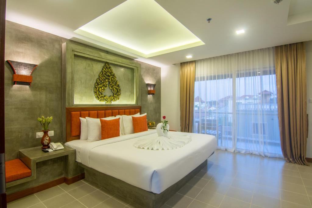Двухместный (Двухместный номер Делюкс с 1 кроватью и балконом) отеля Chhay Long Angkor Boutique Hotel Siem Reap, Сием Рип