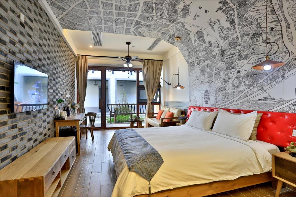 Двухместный (Двухместный номер Делюкс с 1 кроватью и ванной) семейного отеля Youxiake Canal Hotel Hangzhou, Ханчжоу