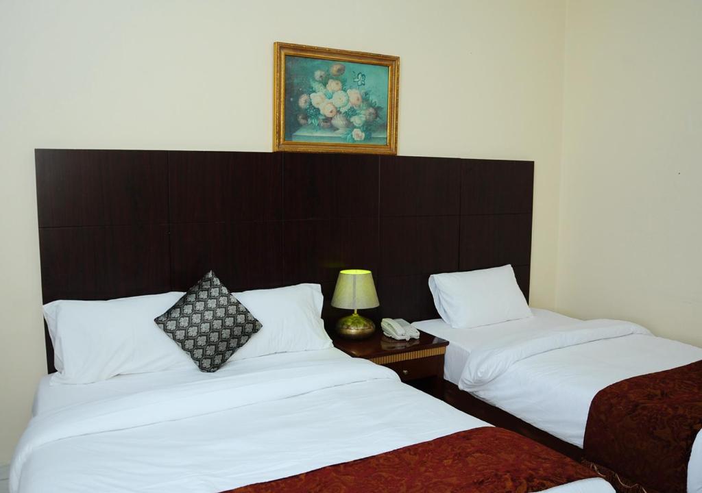 Апартаменты (One Bedroom Queen and Single Bed) апарт-отеля Tulip Inn Hotel Apartment, Аджман