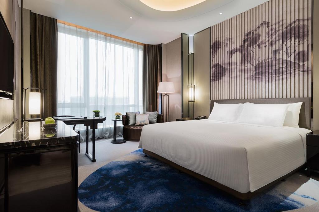 Двухместный (Номер Делюкс с кроватью размера «king-size») отеля Wanda Realm Hotel Wuhu, Уху