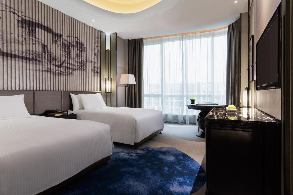 Двухместный (Двухместный номер Делюкс с 2 отдельными кроватями) отеля Wanda Realm Hotel Wuhu, Уху
