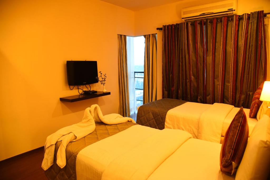 Студио (Люкс-студио), Royal Orchid Suites Whitefield Bangalore