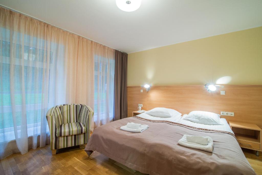 Двухместный (Стандартный двухместный номер с 2 отдельными кроватями) гостевого дома Guest House Milda, Друскининкай