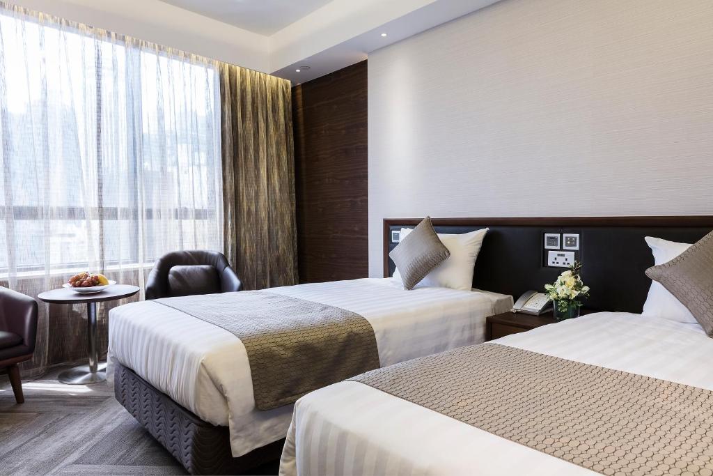 Двухместный (Двухместный номер Делюкс Плюс с 2 отдельными кроватями) отеля Gloucester Luk Kwok Hong Kong, Гонконг (город)