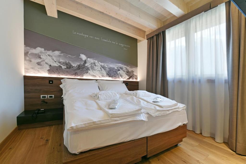 Двухместный (Стандартный двухместный номер с 1 кроватью) отеля Dolomeet Boutique Hotel, Мадонна-ди-Кампильо