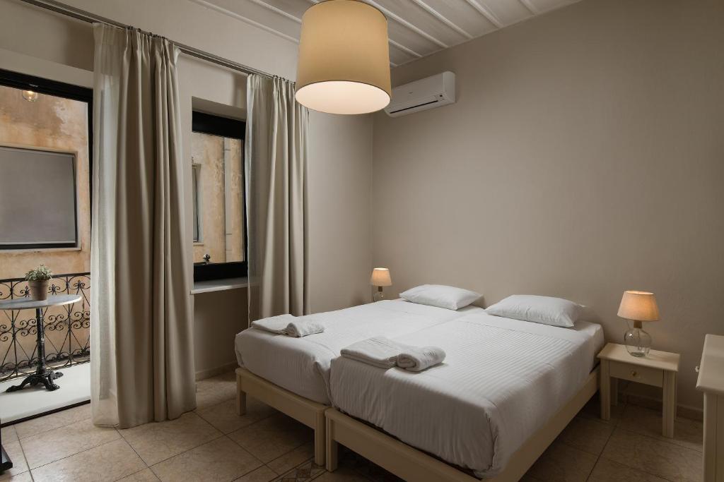 Двухместный (Стандартный двухместный номер с 1 кроватью или 2 отдельными кроватями и балконом) апартамента Nonnalena Boutique Hotel, Ханья