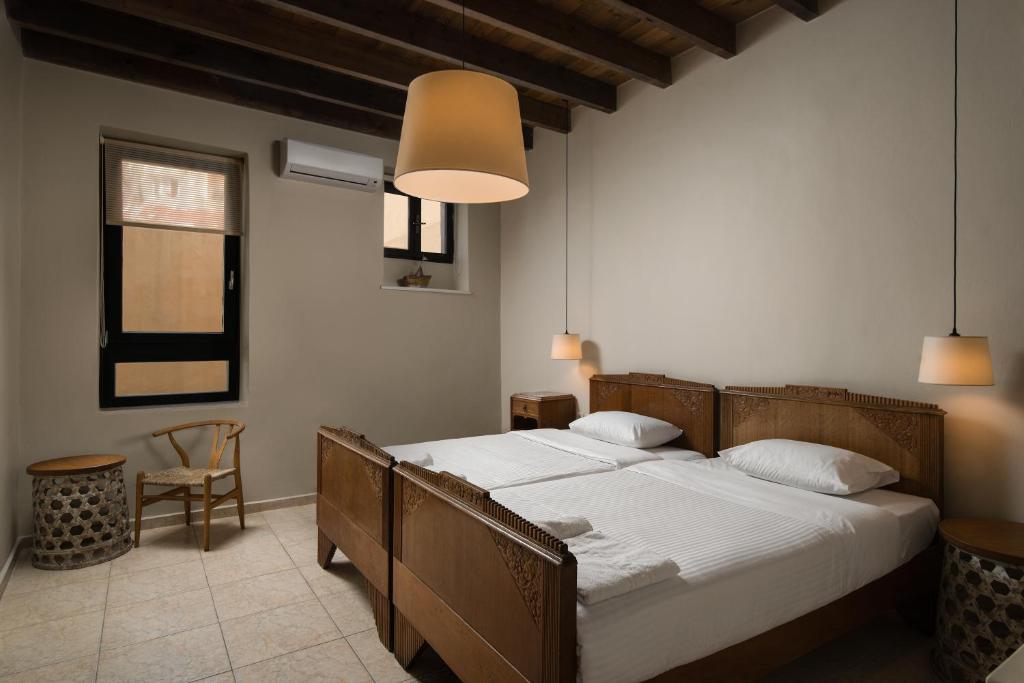 Двухместный (Улучшенный двухместный номер с 1 кроватью или 2 отдельными кроватями) апартамента Nonnalena Boutique Hotel, Ханья