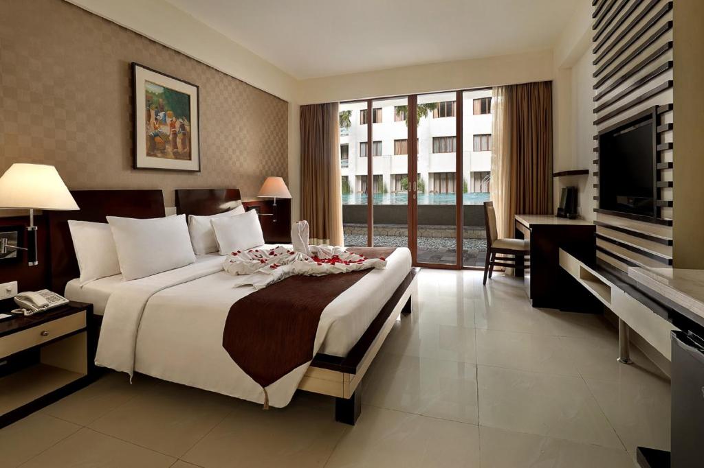 Двухместный (Двухместный номер Делюкс с 1 кроватью или 2 отдельными кроватями) отеля Aston Kuta Hotel and Residence, Кута