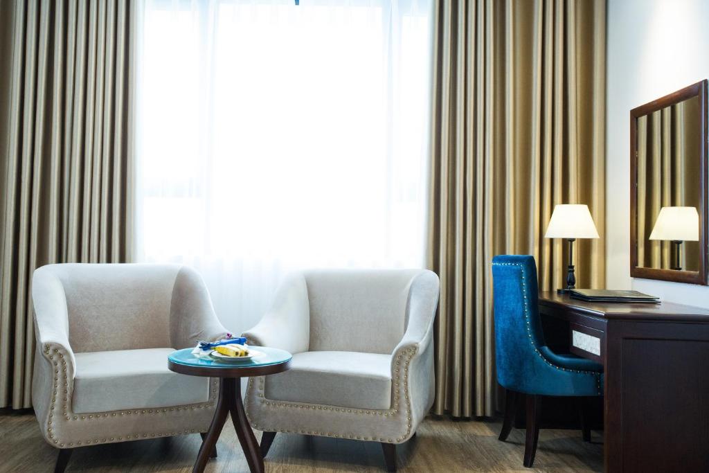 Двухместный (Улучшенный двухместный номер с 1 кроватью или 2 отдельными кроватями) отеля Song Loc Luxury Hotel, Халонг