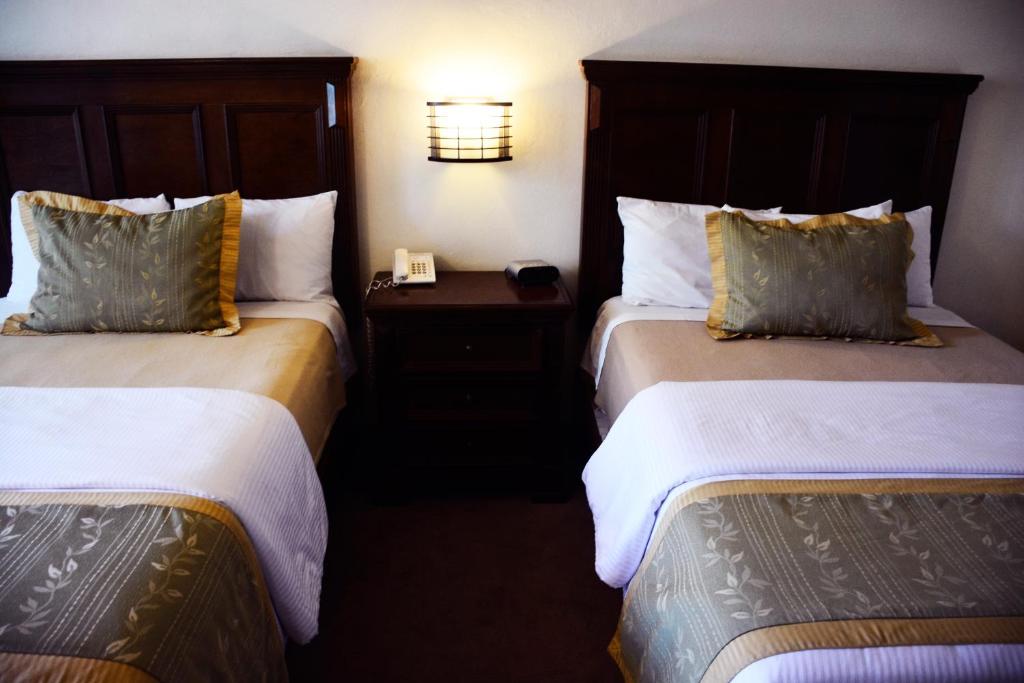 Четырехместный (Двухместный номер с 2 двуспальными кроватями) отеля Best Western Tequisquiapan, Текискиаппан