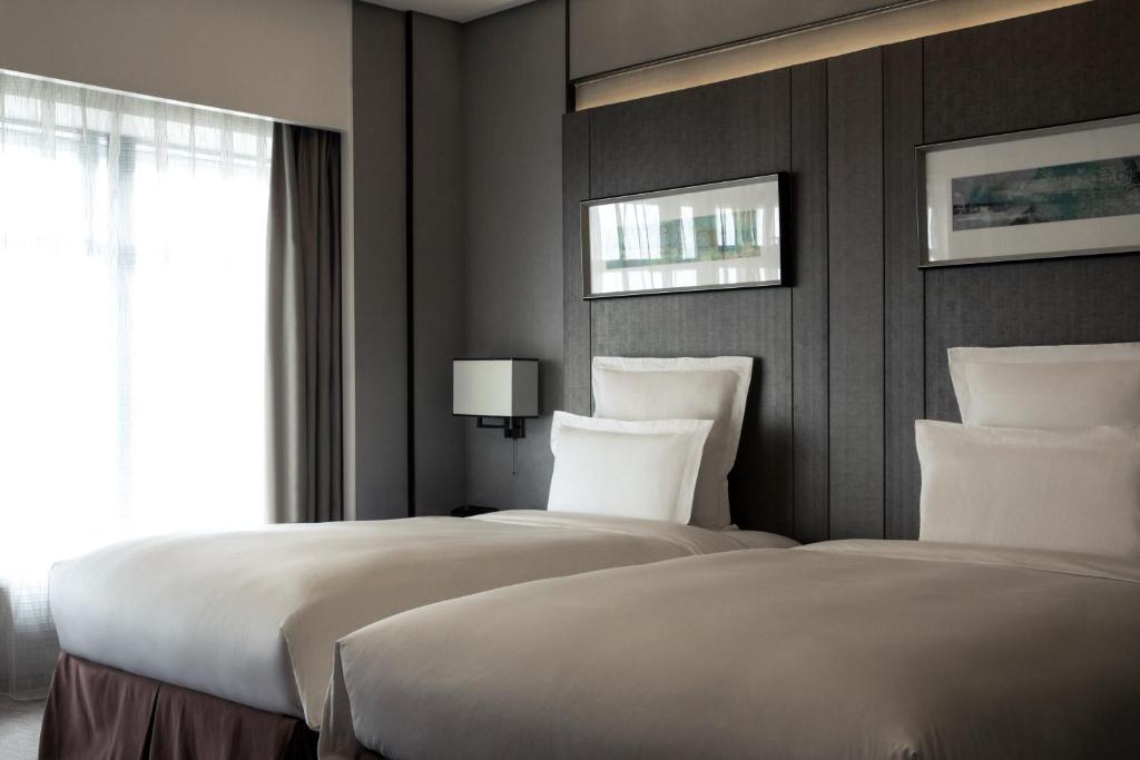 Двухместный (Улучшенный двухместный номер с 2 отдельными кроватями) отеля Pullman Shanghai South, Шанхай