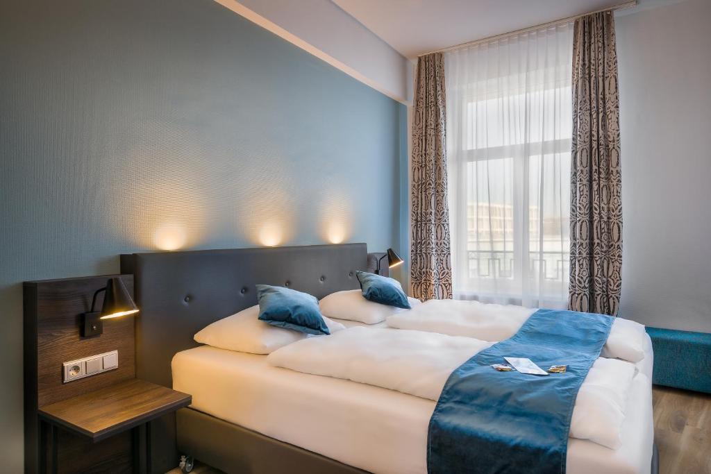 Двухместный (Стандартный двухместный номер с 2 отдельными кроватями) отеля Novum Hotel Ruf Pforzheim, Баден-Баден