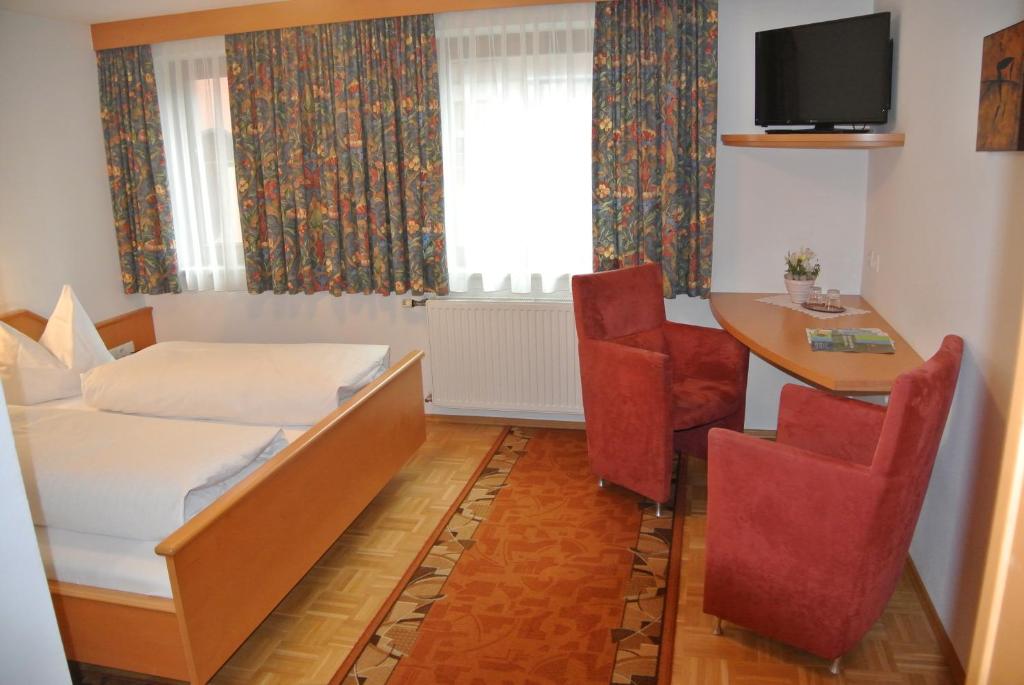Двухместный (Улучшенный двухместный номер с 1 кроватью) отеля Gasthof Zum Stollhofer, Зефельд-ин-Тироль