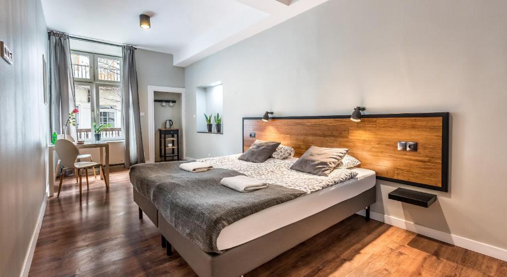 Двухместный (Улучшенный двухместный номер с 1 кроватью или 2 отдельными кроватями) апарт-отеля Podwale Apartments, Краков