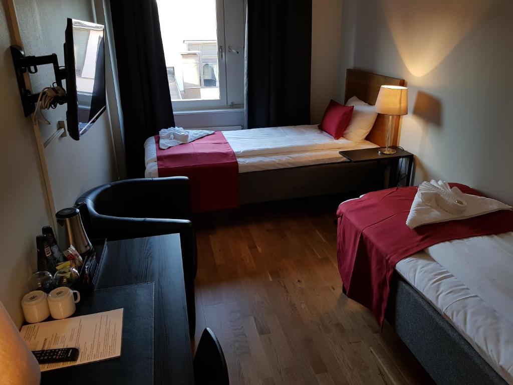 Двухместный (Двухместный номер эконом-класса с 2 отдельными кроватями) отеля City Hotel, Кристинехамн