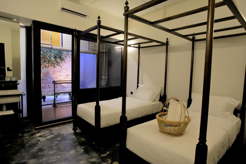 Двухместный (Улучшенный двухместный номер с 2 отдельными кроватями и видом на сад) отеля Tian Jing Hotel, Куала-Лумпур