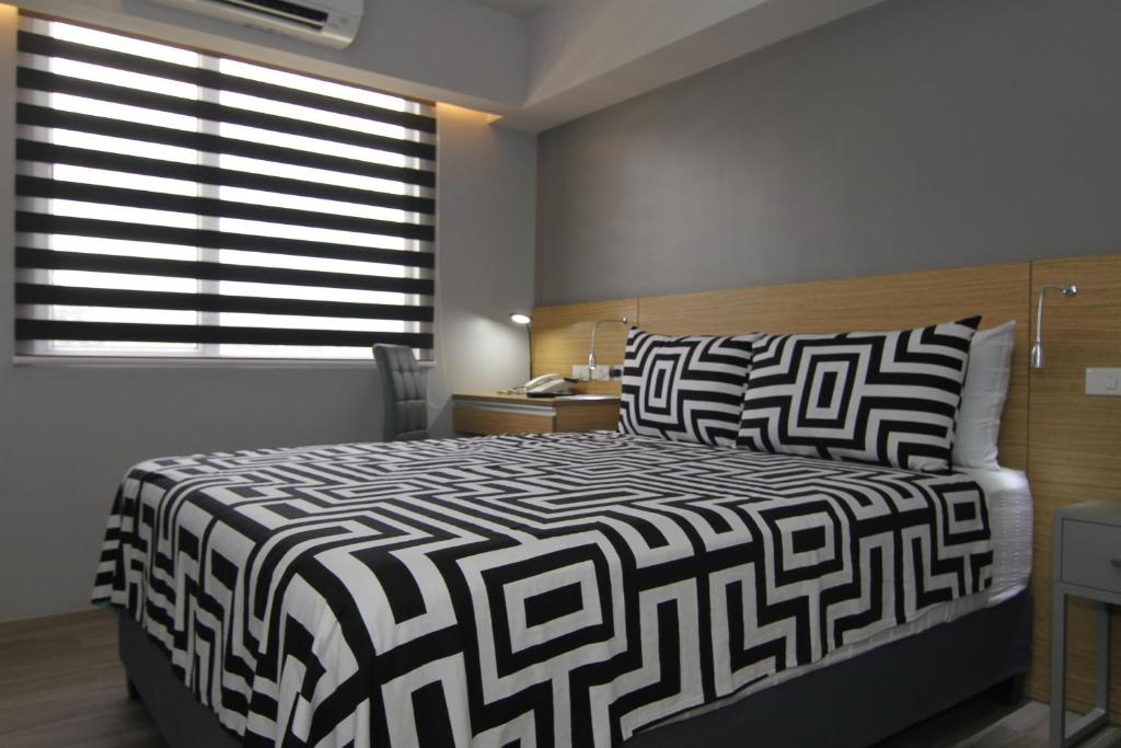 Двухместный (Номер Делюкс с кроватью размера «queen-size») отеля Cebu Hotel Plus, Себу
