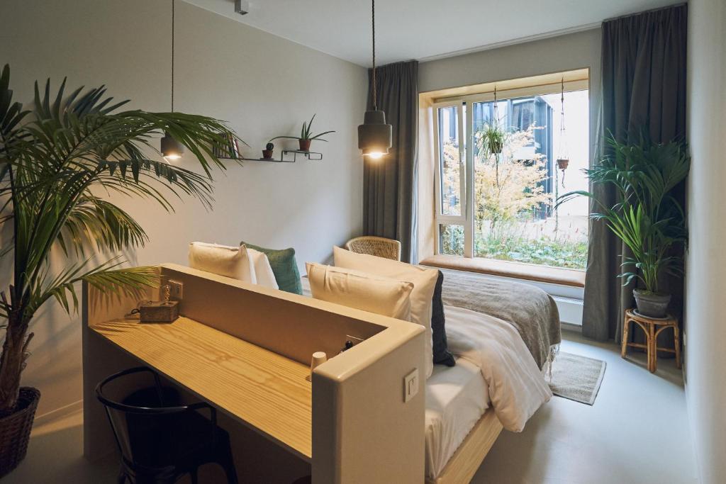 Двухместный (Двухместный номер Делюкс с 1 кроватью или 2 отдельными кроватями, вид на сад) отеля Jardin Secret, Брюссель