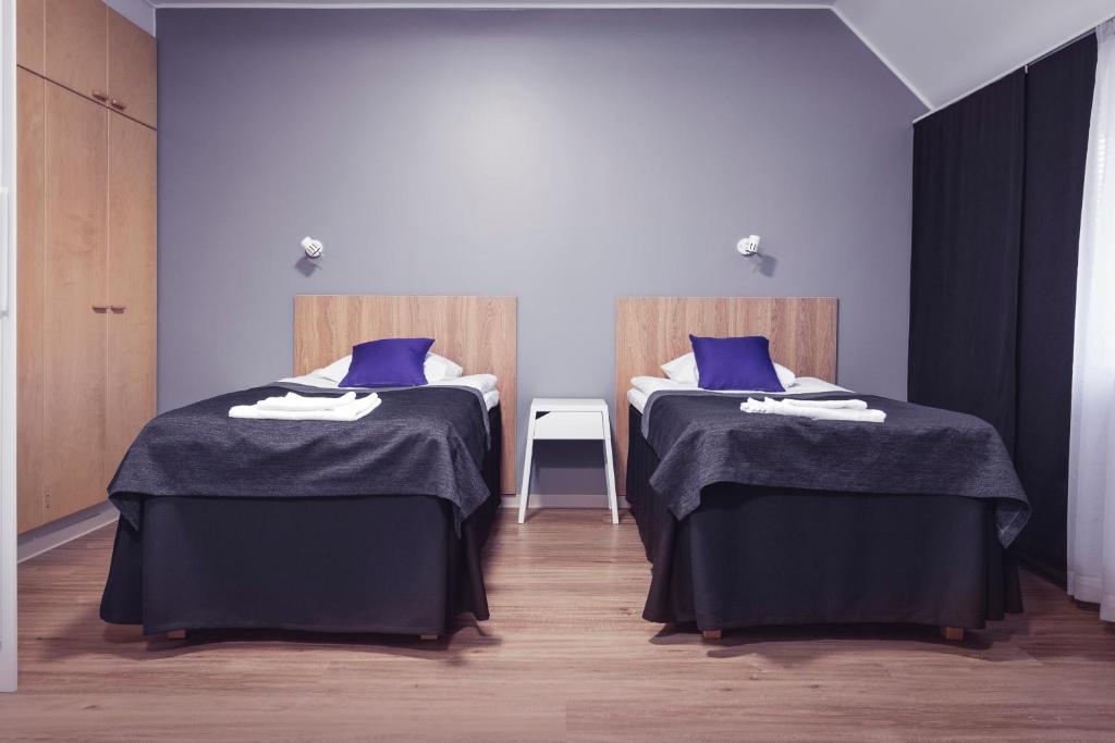 Двухместный (Улучшенный двухместный номер с 2 отдельными кроватями) отеля Hotel Vuokattisport, Вуокатти
