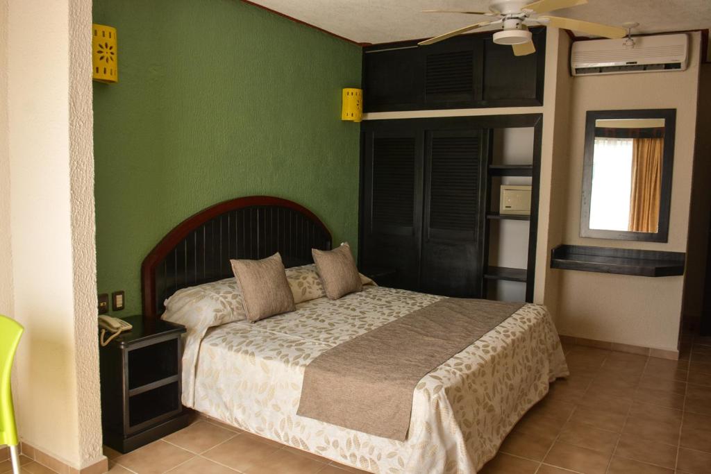 Двухместный (Номер с кроватью размера «king-size») отеля Suites Los Arcos, Исла-Мухерес