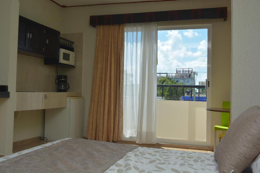 Двухместный (Номер с кроватью размера «queen-size») отеля Suites Los Arcos, Исла-Мухерес