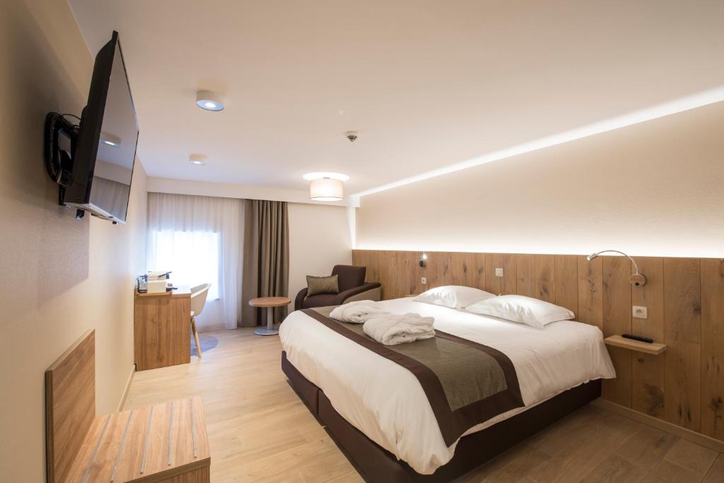 Двухместный (Двухместный номер «Комфорт» с 1 кроватью или 2 отдельными кроватями) отеля Hotel Le Fournil, Сент-Юбер
