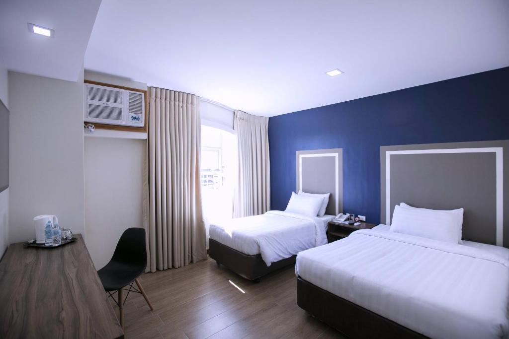 Трехместный (Трехместный номер Делюкс) отеля S Hotel & Residences, Себу