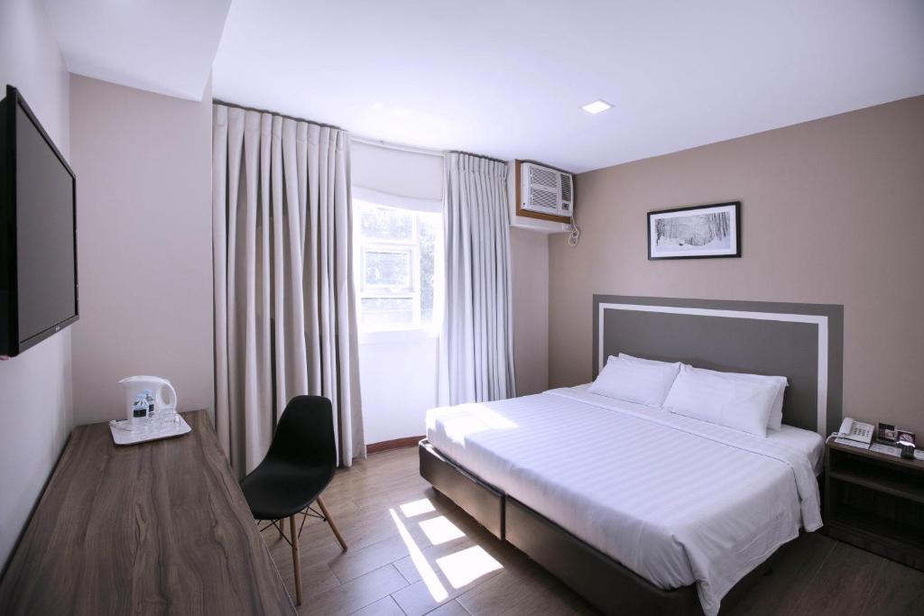 Двухместный (Стандартный двухместный номер с 2 отдельными кроватями) отеля S Hotel & Residences, Себу