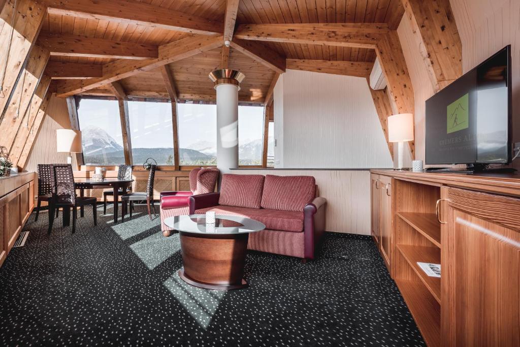 Сьюит (Панорамный люкс) отеля Krumers Alpin Resort & Spa, Зефельд-ин-Тироль