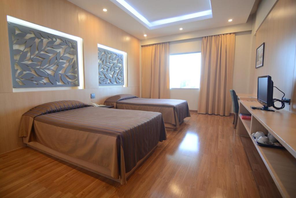 Двухместный (Двухместный номер «Гранд» Делюкс с 2 отдельными кроватями) отеля Charoen Hotel, Удонтхани