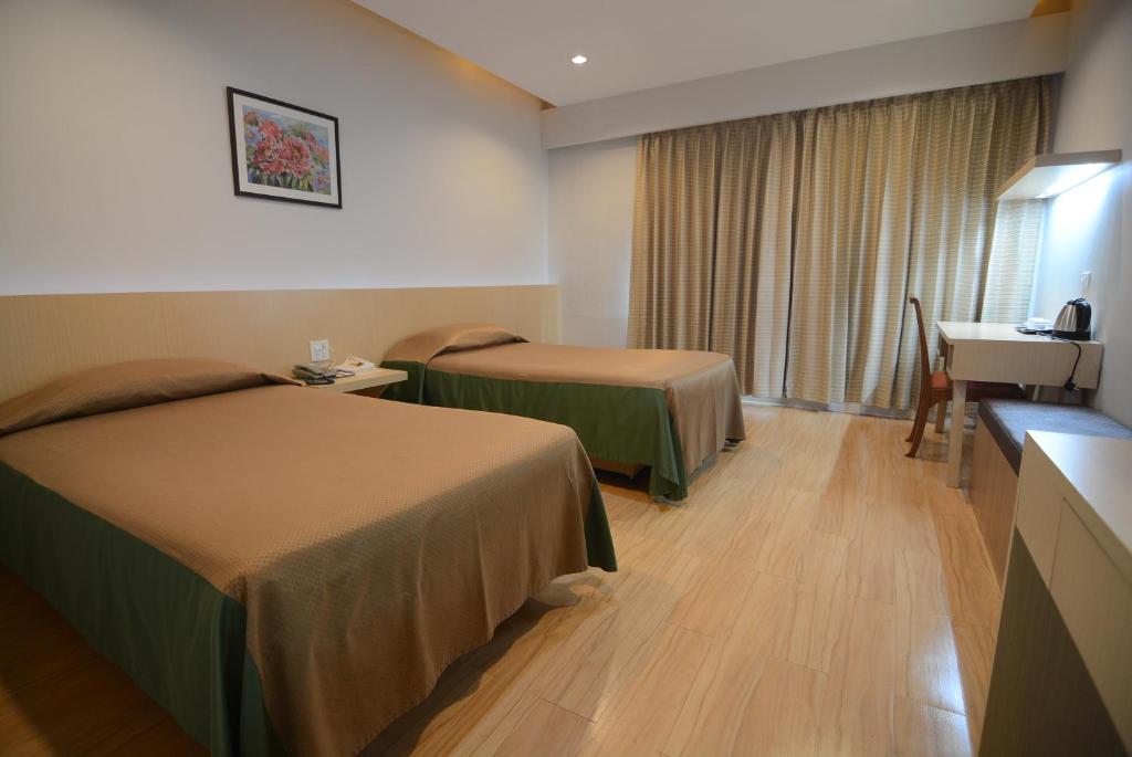 Двухместный (Двухместный номер Делюкс с 2 отдельными кроватями) отеля Charoen Hotel, Удонтхани