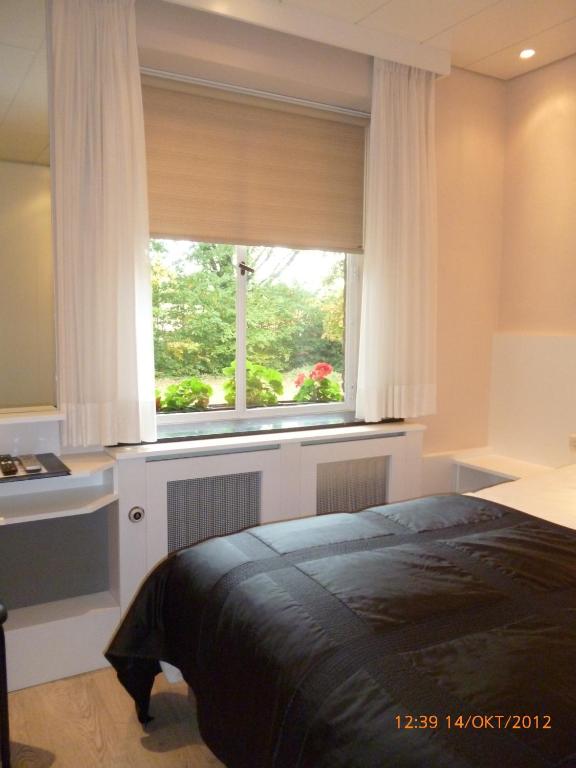 Двухместный (Двухместный номер с 1 кроватью и собственной ванной комнатой вне номера) отеля Hotel Landgoed Schoutenhof, Маастрихт