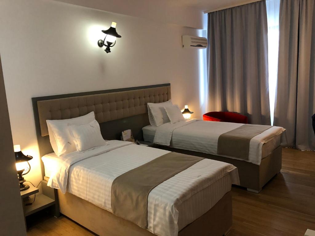 Двухместный (Двухместный номер с 1 кроватью или 2 отдельными кроватями - Подходит для гостей с ограниченными физическими возможностями) отеля Ambra Boutique Hotel & Bistro, Констанца