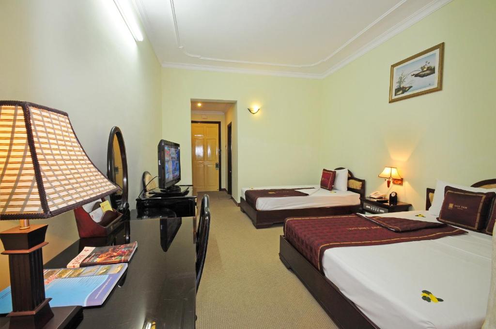 Двухместный (Двухместный номер Делюкс с 1 кроватью или 2 отдельными кроватями) отеля Duy Tan Hotel, Хюэ