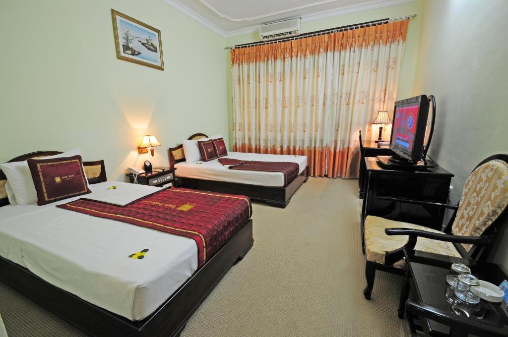 Двухместный (Улучшенный двухместный номер с 1 кроватью или 2 отдельными кроватями) отеля Duy Tan Hotel, Хюэ