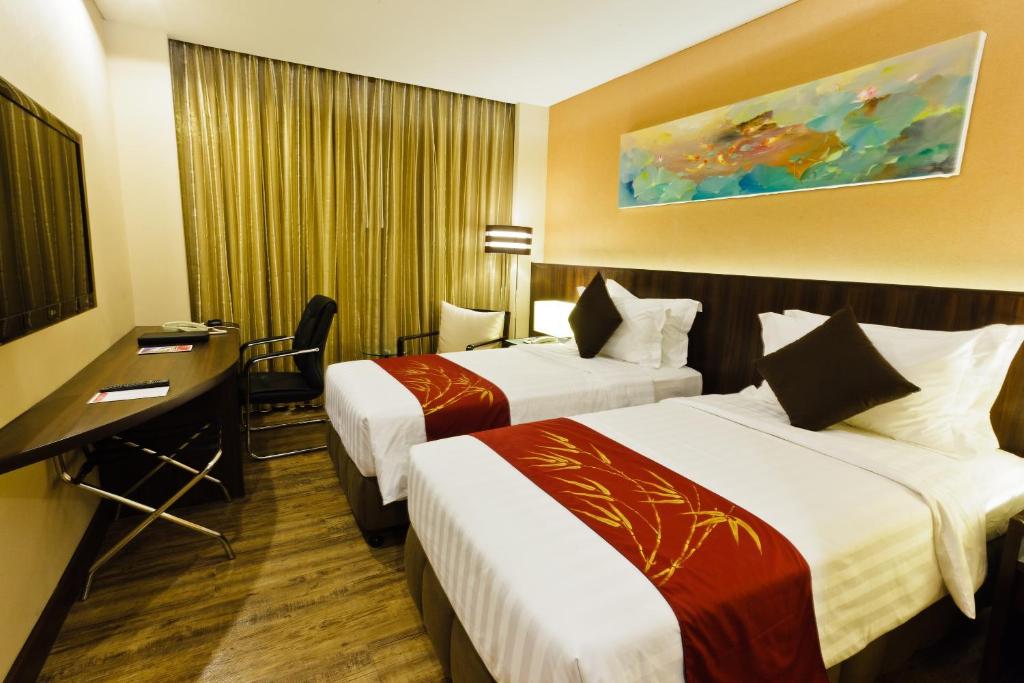 Двухместный (Улучшенный двухместный номер с 1 кроватью или 2 отдельными кроватями) отеля Ramada by Wyndham Manila Central, Манила
