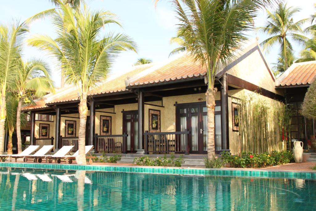 Двухместный (Номер Делюкс — На побережье) курортного отеля Lotus Village Resort, Фантхьет