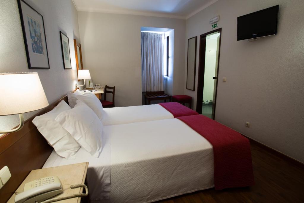 Двухместный (Стандартный двухместный номер с 2 отдельными кроватями) отеля Hotel Solaris, Сетубал