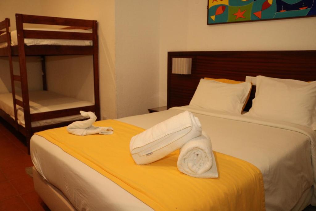 Трехместный (Трехместный номер) отеля Residencial Mar e Sol, Кошта-да-Капарика
