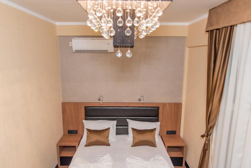 Двухместный (Двухместный номер Делюкс с 1 кроватью или 2 отдельными кроватями) отеля Hotel Crnogorska Kuća, Подгорица