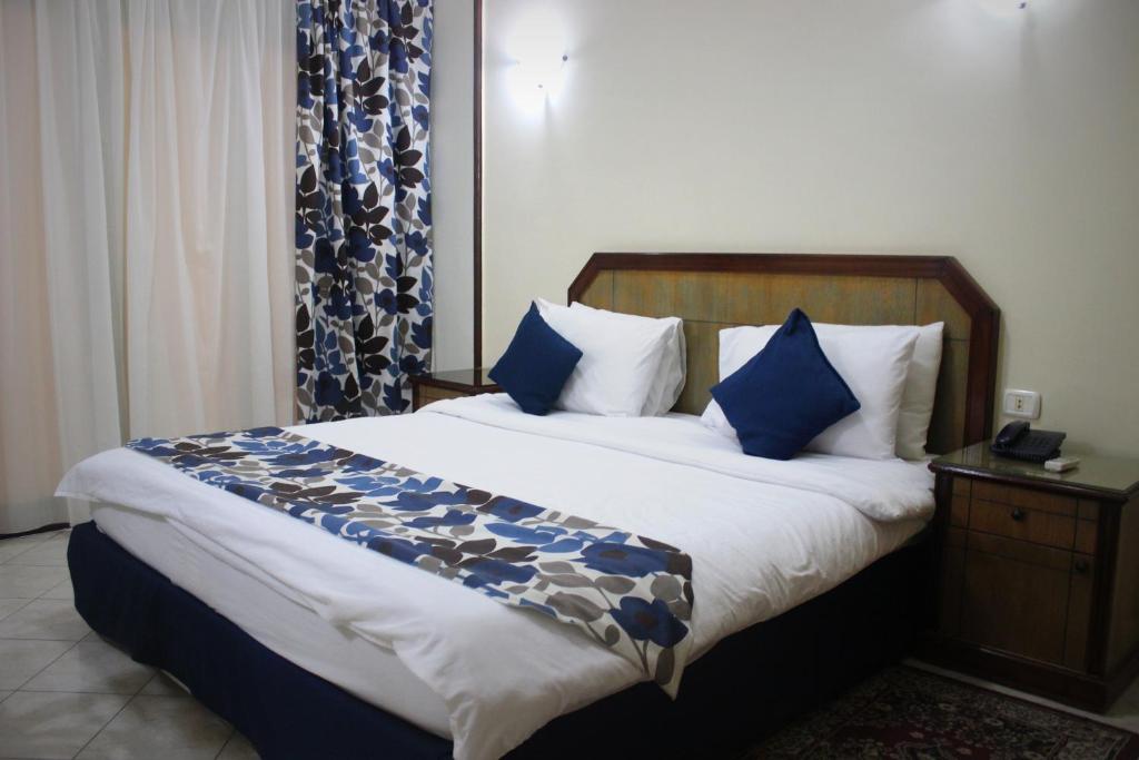 Двухместный (Двухместный номер Делюкс с 1 кроватью или 2 отдельными кроватями, вид на задний двор — Только для граждан и резидентов Египта) курортного отеля Aifu Resort - El Montazah, Александрия
