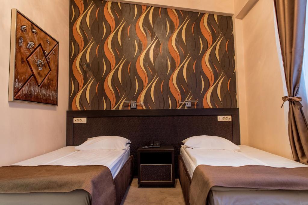 Двухместный (Двухместный номер эконом-класса с 2 отдельными кроватями) отеля Hotel Crnogorska Kuća, Подгорица