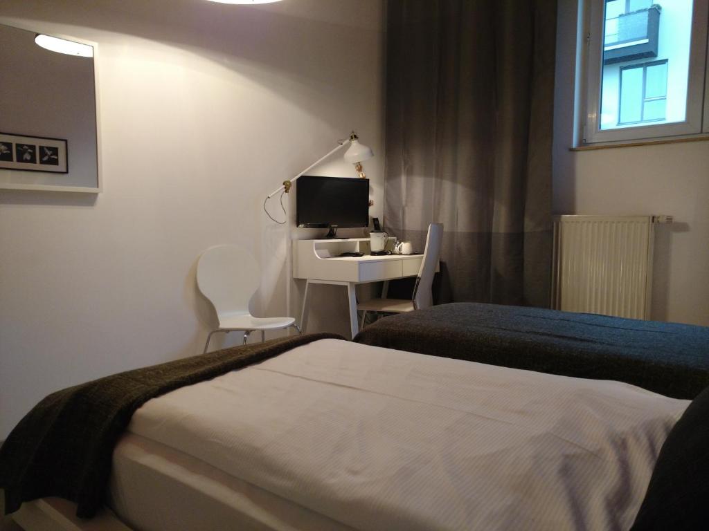 Двухместный (Бюджетный двухместный номер с 2 отдельными кроватями) гостевого дома Midi Inn Parkhotel Mitte, Берлин