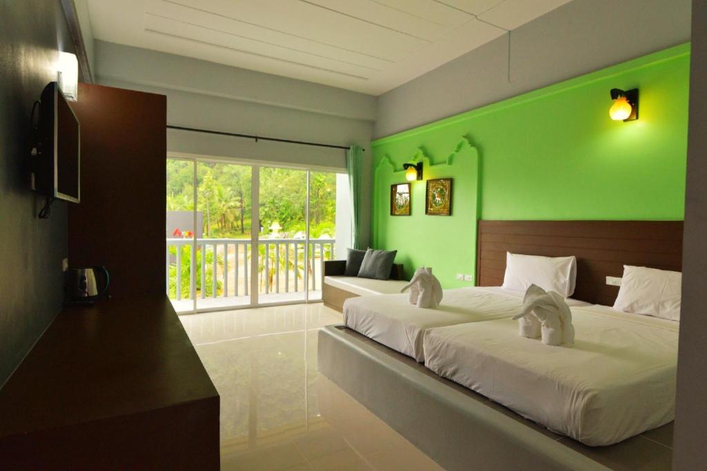 Семейный (Семейный номер Делюкс с видом на море) отеля Arawan Krabi Beach Resort, Краби