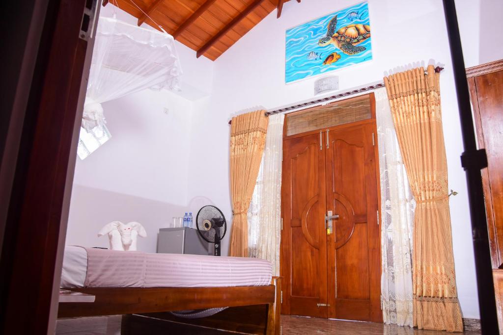 Двухместный (Двухместный номер Делюкс с частичным видом на море) гостевого дома Channa Villa & Tours, Бентота