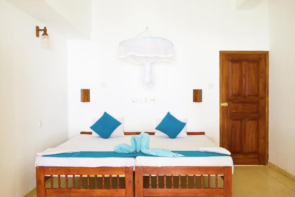 Двухместный (Стандартный двухместный номер с 1 кроватью или 2 отдельными кроватями, вид на море) гостевого дома Beach Inns Holiday Resort, Матара