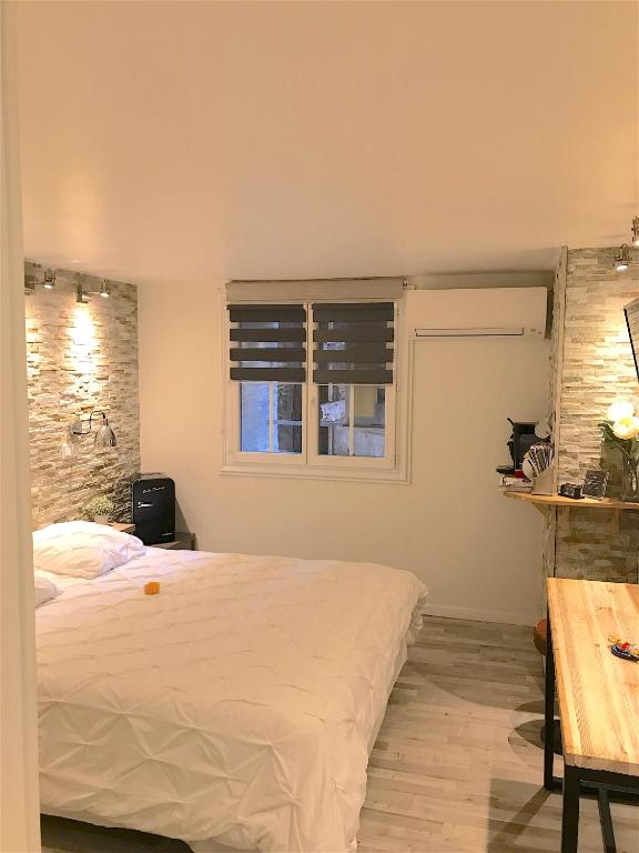 Двухместный (Улучшенный двухместный номер с 1 кроватью) гостевого дома MarseilleCity, Марсель