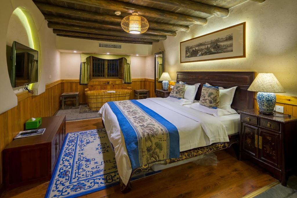 Семейный (Семейный люкс с 2 спальнями) курортного отеля Yangshuo Ancient Garden Boutique Hotel, Яншо