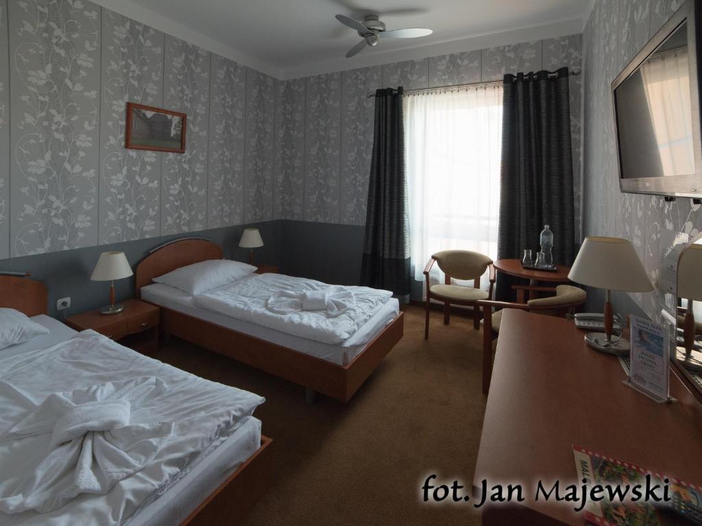 Двухместный (Двухместный номер Делюкс с 2 отдельными кроватями) отеля Hotel Majewski, Мальборк