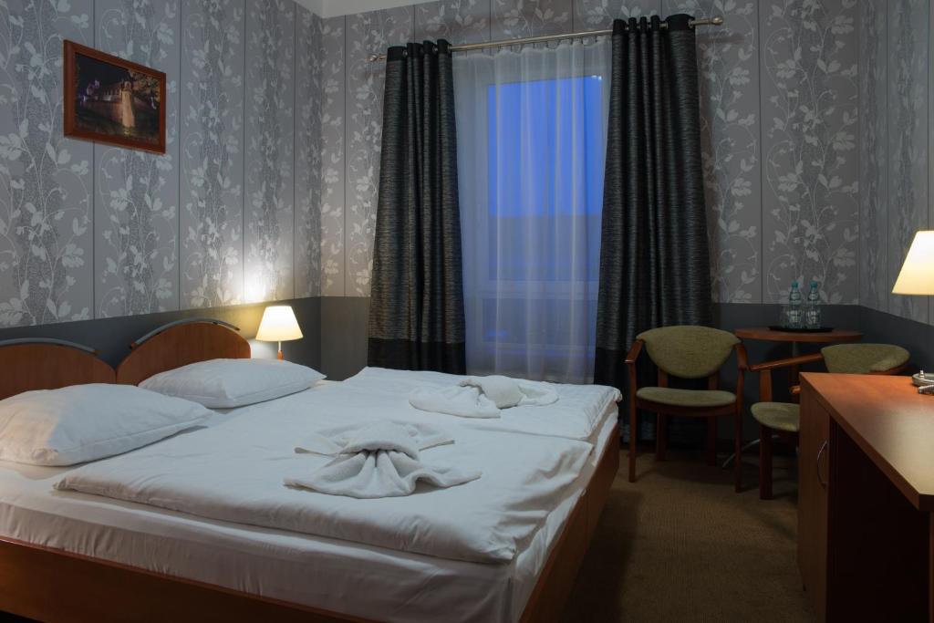 Двухместный (Двухместный номер Делюкс с 1 кроватью) отеля Hotel Majewski, Мальборк